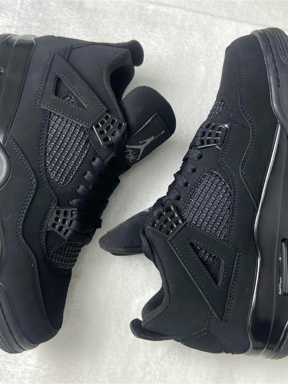 Jordan Men’s Black Retro 4 Sneakers